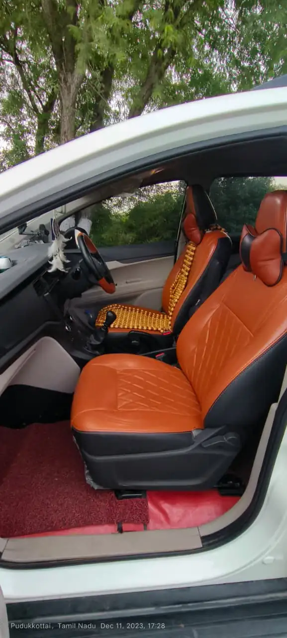 MUV driver and front passenger seats with tan upholstery