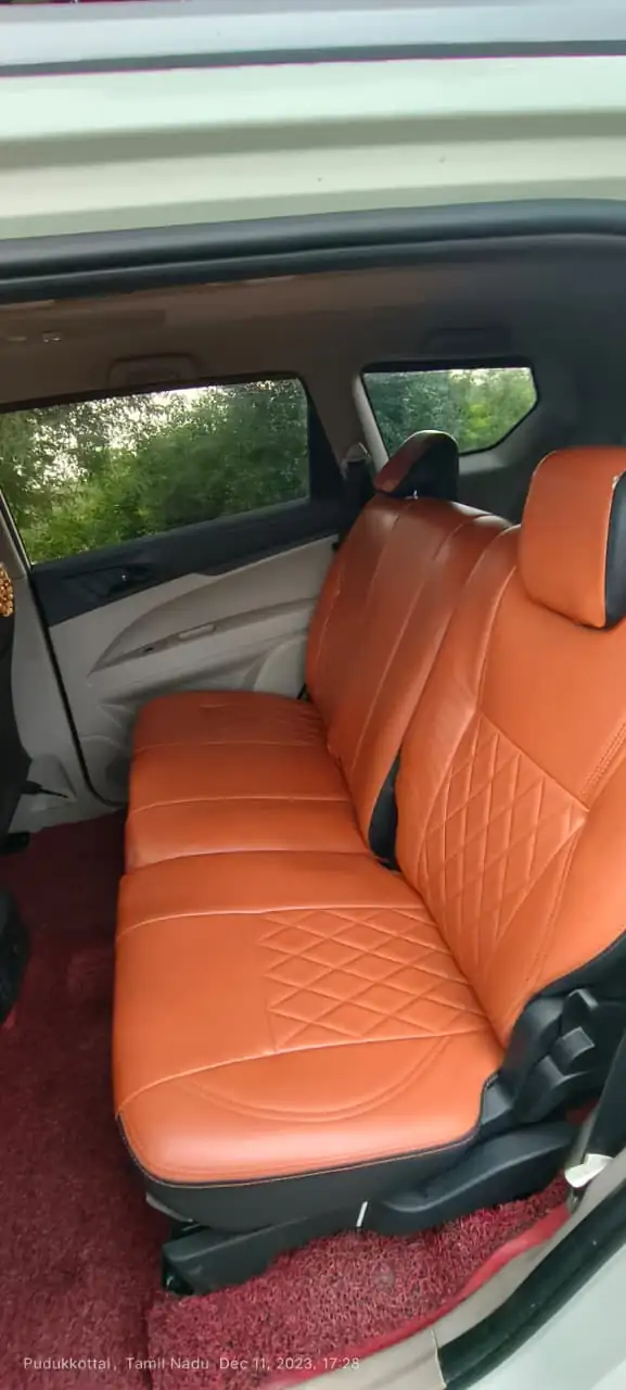 Clean MUV rear bench with tan upholstery
